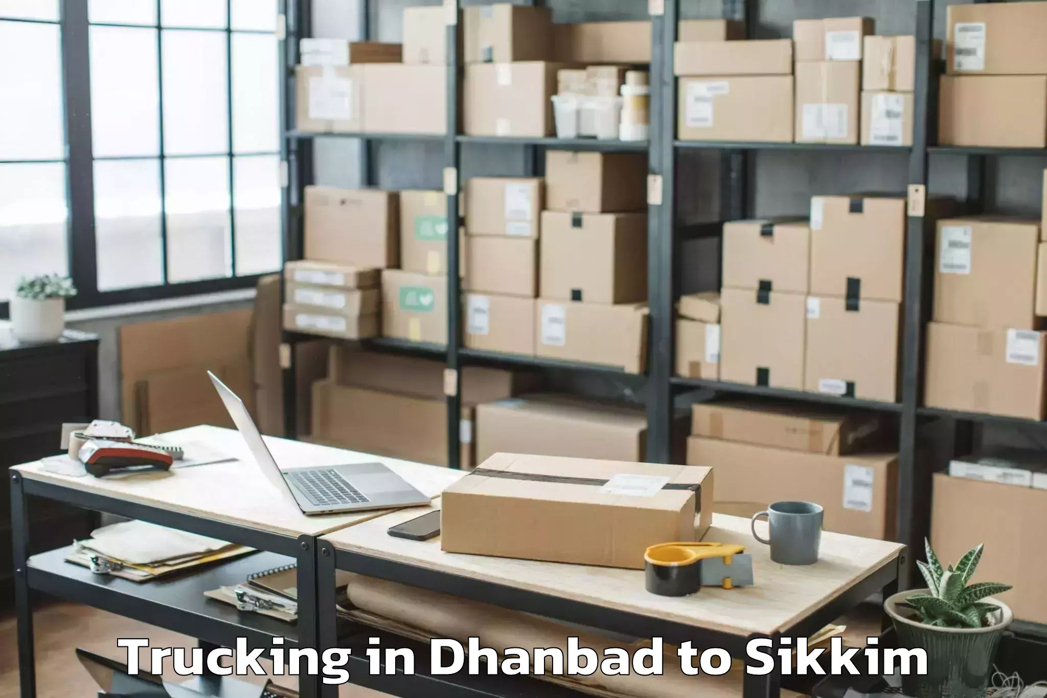 Top Dhanbad to Icfai University Sikkim Gangto Trucking Available